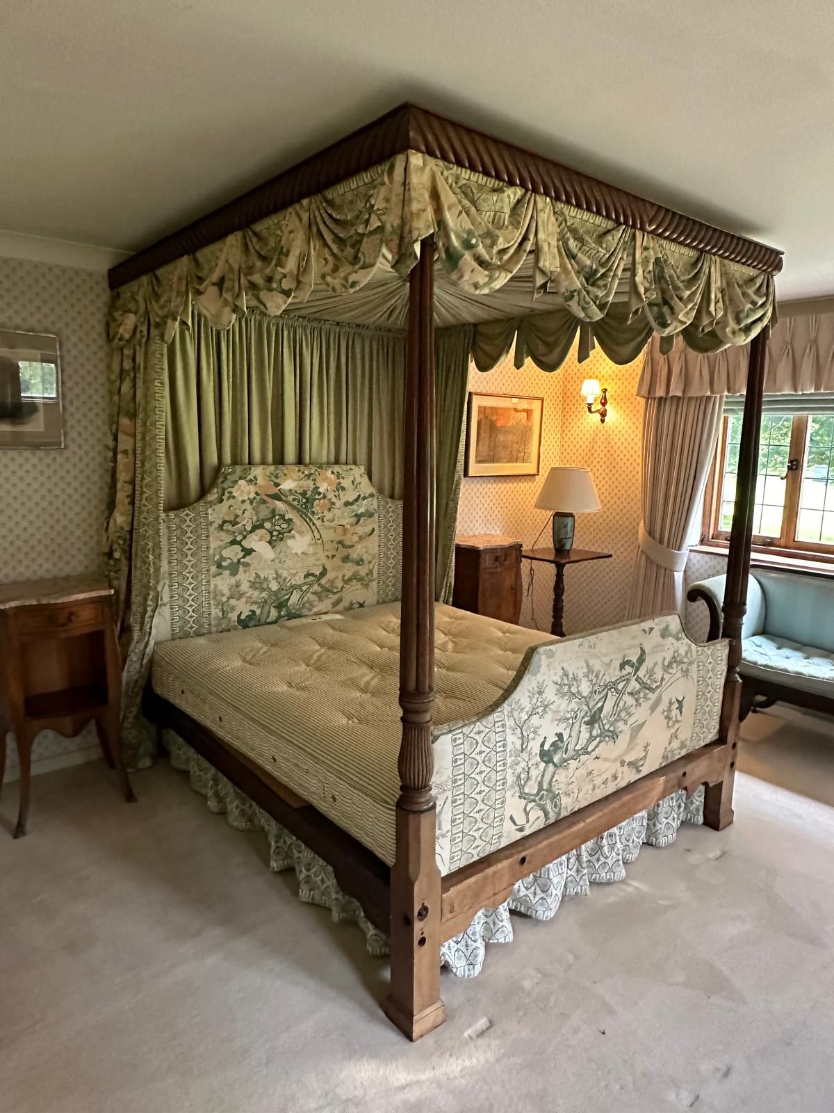 A George III style mahogany four poster bedstead